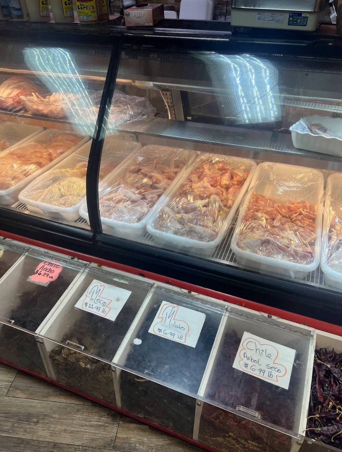 Fresh meat counter and dried chiles by the pound